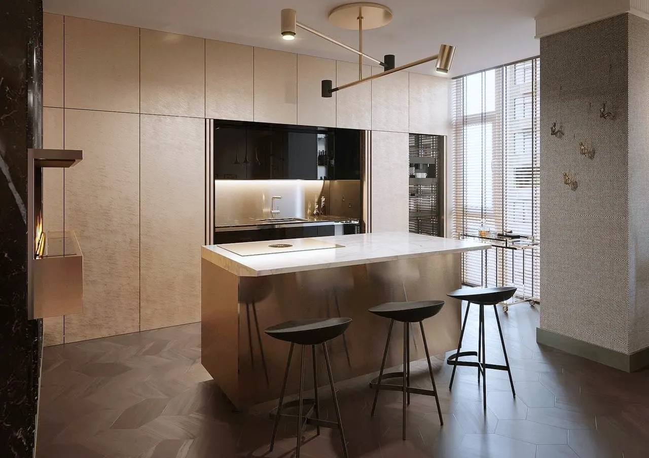 Kitchen island with reflective surfaces and sculptural lighting