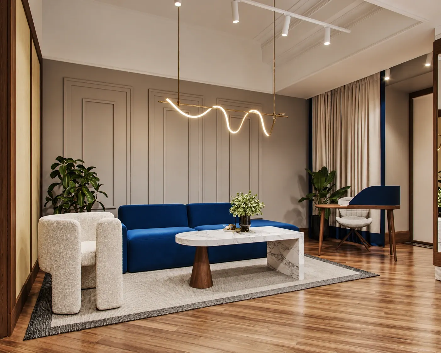 Blue sofa, cream armchair and sculptural pendant above a white veined coffee table.