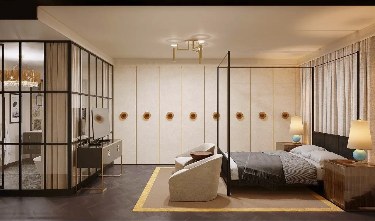 Four-poster bed and glazed bathroom partition